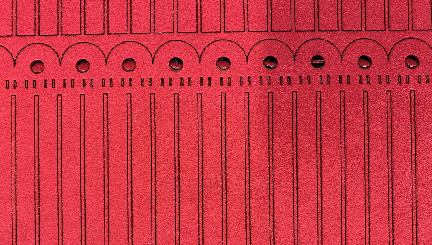 Détail de découpe laser sur textile